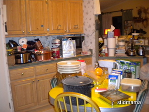 kitchen counter before shot, note miscellaneous everything on the one counter!