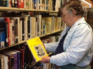 Mother, holding a copy of Hetty Clew's book, "The Only Teller" at the SSI public library.  Hetty used to live on the island, and was a strong supporter of both the library and the arts.  We miss her.