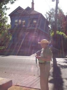 Mother in front of the beautifully restored "painted lady" across from the James Bay Inn on Government Street in Victoria.  The sun was bright!