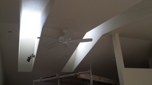 You can see the extra lights I have in the skylight well, they will shine onto the wall and a game table (eventually).  Hoping the large blades on the fan won't make a flicker from the skylights.