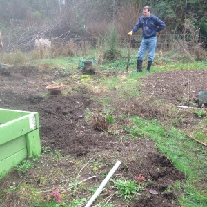 Tom leaning on spading fork