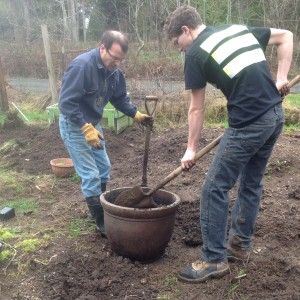 Tom and Grant filling a pot