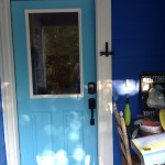 The dragonfly door knocker from a friend in Canada.  I love how it looks next to the bright blue door!